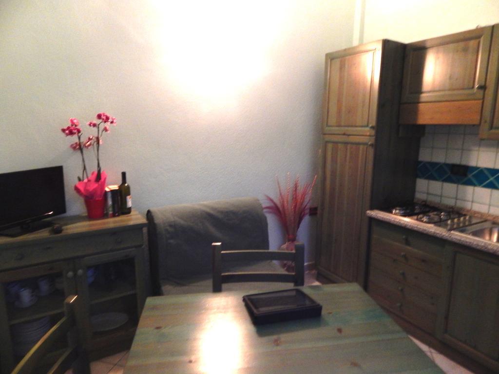 Appartamento Magnolia Cala Liberotto Szoba fotó