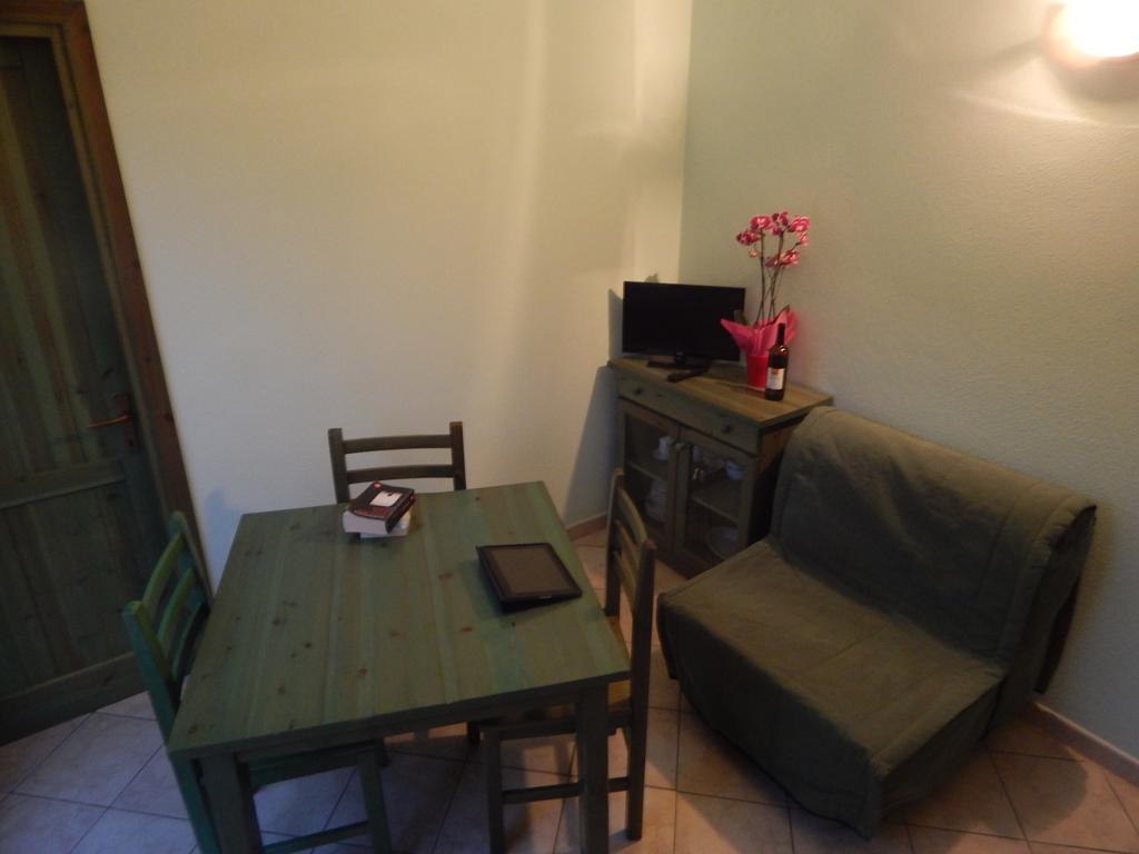 Appartamento Magnolia Cala Liberotto Szoba fotó