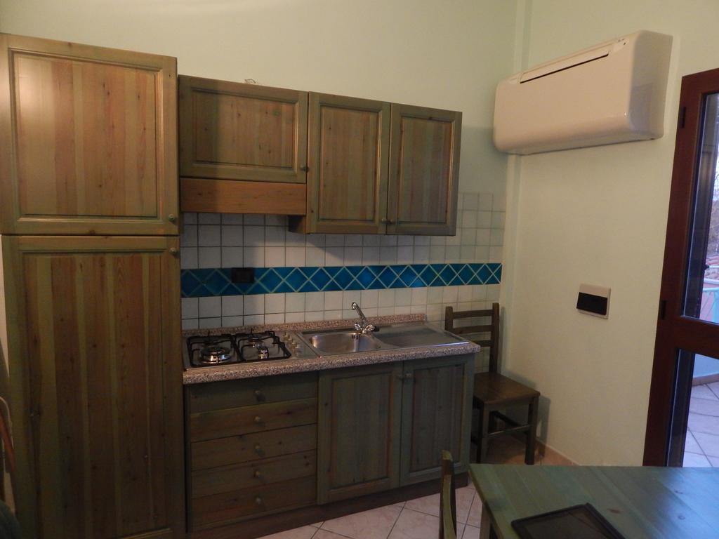 Appartamento Magnolia Cala Liberotto Szoba fotó